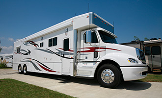 A diesel style class A white RV